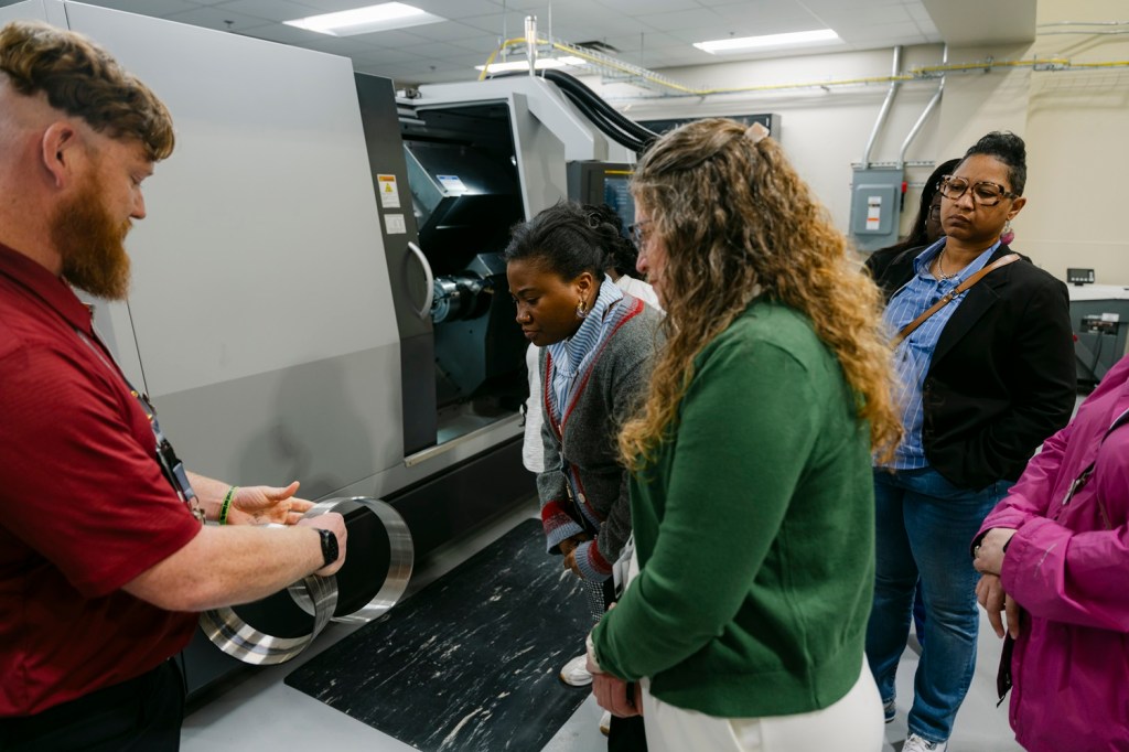 Educators tour training center, explore defense missions at SRS