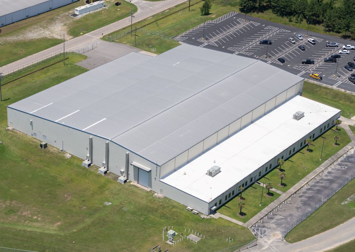 The existing High-Fidelity Training and Operations Center (HFTOC) building (pictured here) must be modified to include demolition work and installation of new key systems.
