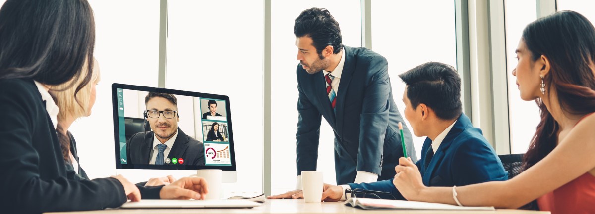 Video call group business people meeting on virtual workplace or remote office. Telework conference call using smart video technology to communicate colleague in professional corporate business.